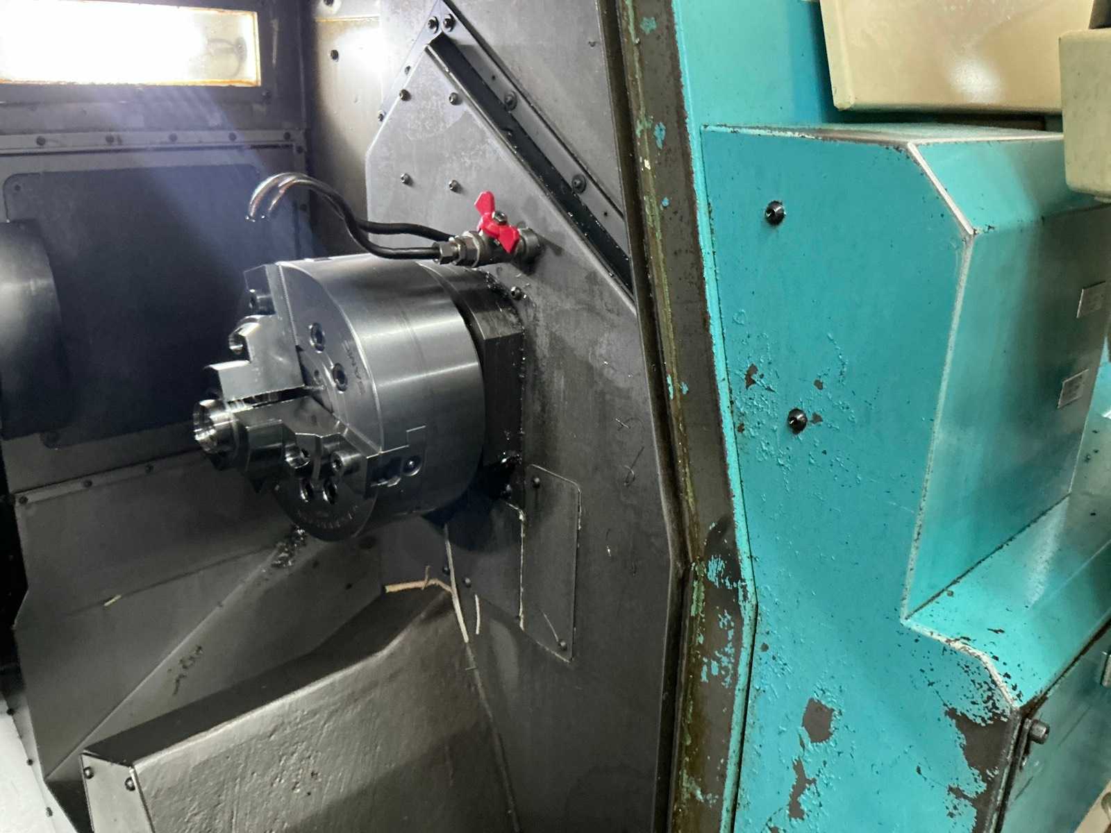 2001 Muratec MT12 Dubbelkops CNC draaibank met Samsys multi 5-65 aanvoer